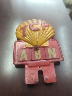 Antique shell oil 1940s license plate topper with drivers initials
