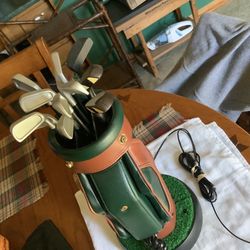 Leather Golf bag with clubs 16” landline push button phone. From the 1990s a great display piece for the golfer who has everything. In mint condition 
