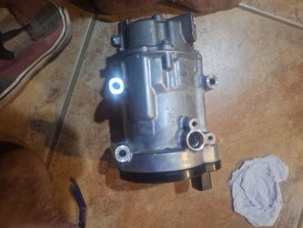 Hybrid ac compressor