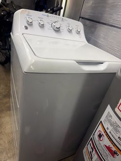 GE washer with agitator and gas dryer top load