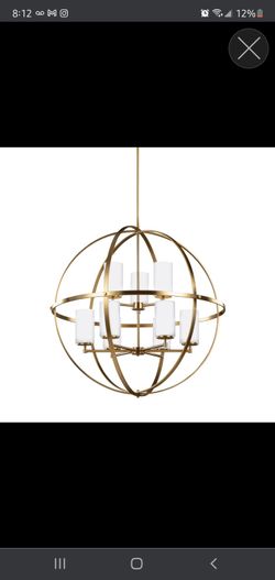 NEW STILL IN BOX. NEVER OPENED. 9 Light Sphere Chandelier 