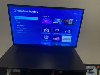 32 inch roku tv w/remote + Tv Stand