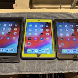 Selling Three iPad Air MD785LL/B A1474 16 GB Case Included 