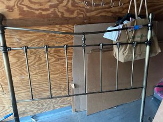 Full size brass headboard