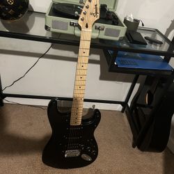 squier stratocaster guitar