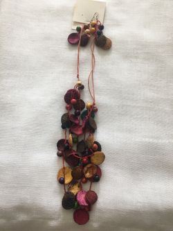 Hand made jewelry made in Colombia from fruit seeds