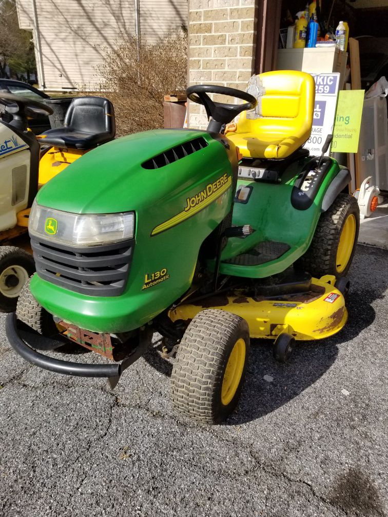 John Deere L130 tractor, lawn mower