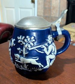 Vintage German Gerz blue background with white raised relief hunting scene stoneware beer stein