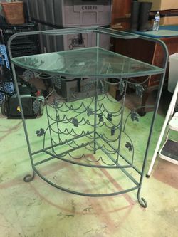 Wine rack decorative with vines glass top