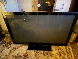 Samsung tv glass frame and stand on tv