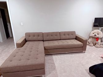Brown sectional couch
