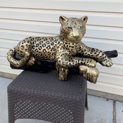 Golden Leopard On The Log Statue
