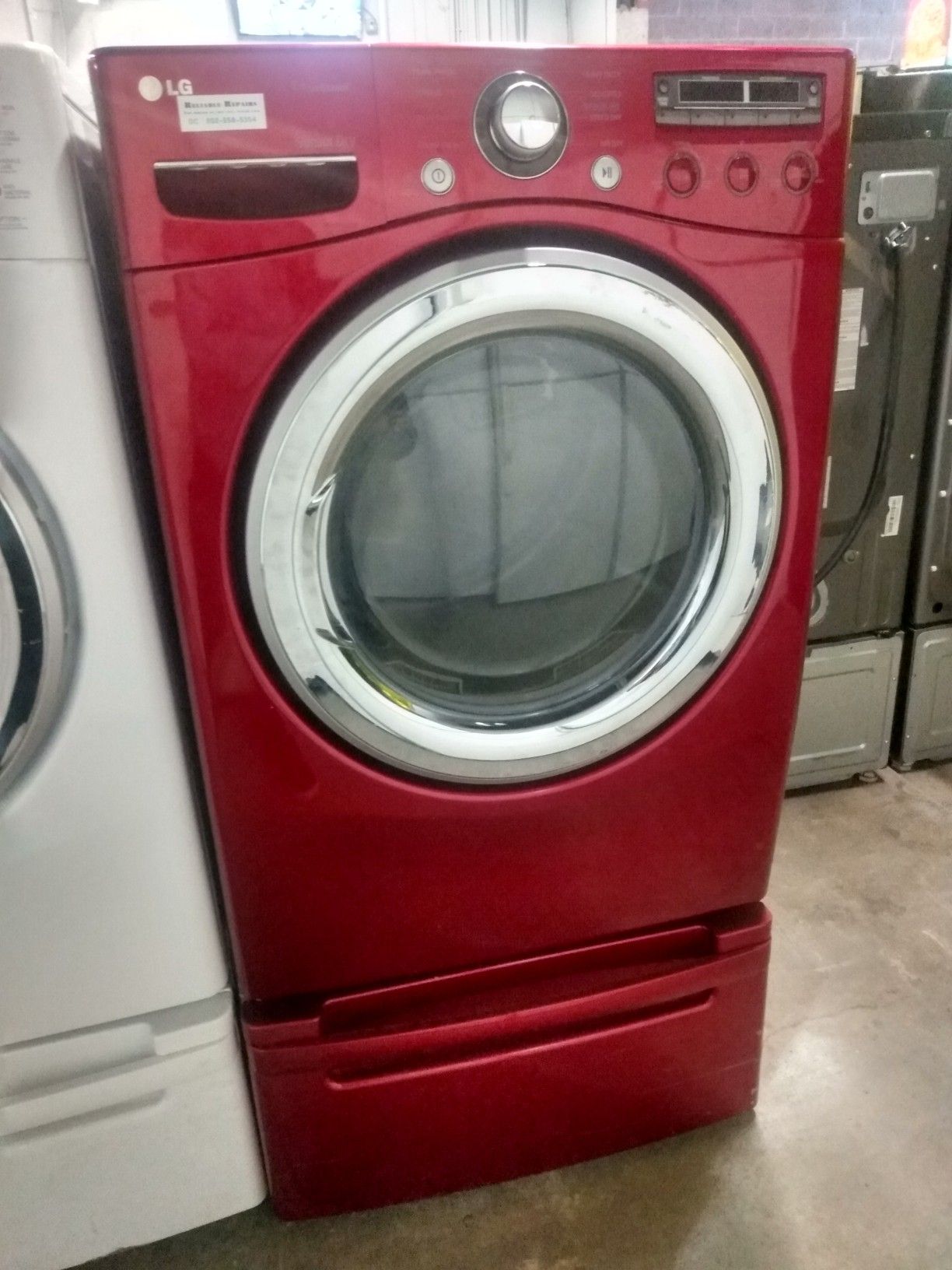 LG front load steam electric dryer with pedestal in excellent condition