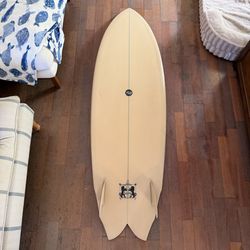 5’10 Larry Mabile yew fish surfboard