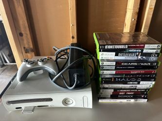 Xbox 360 with controller and 16 games