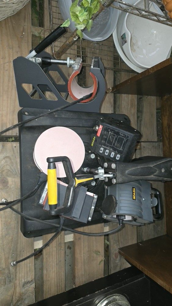 multifunctional sublimation machine, also known as a heat press or heat fixer