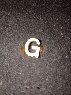 Gold ring letter g