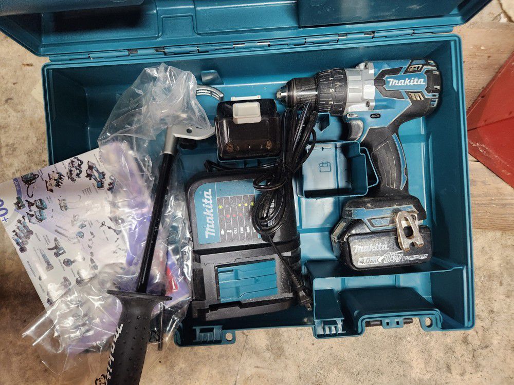 Makita Hammer Drill With 2 4ah Batteries And Charger