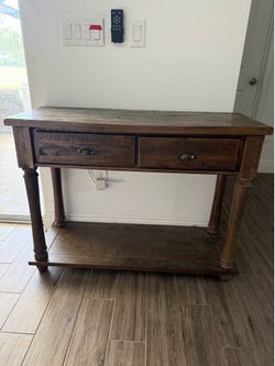 Brown wood entry table
