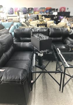 Black sofa and love seat