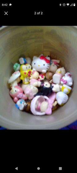 Hello Kitty Buttons And Figurines 