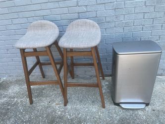 2 modern grey barstools +stainless steel trashcan