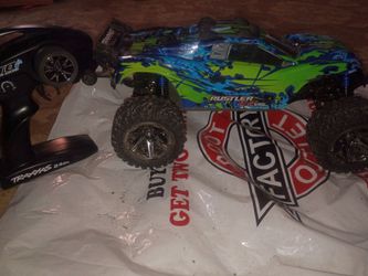 $225 TRAXXAS RUSTLER VXL 4X4..