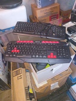 Two different plug in keyboards five dollars a piece or 7 for both