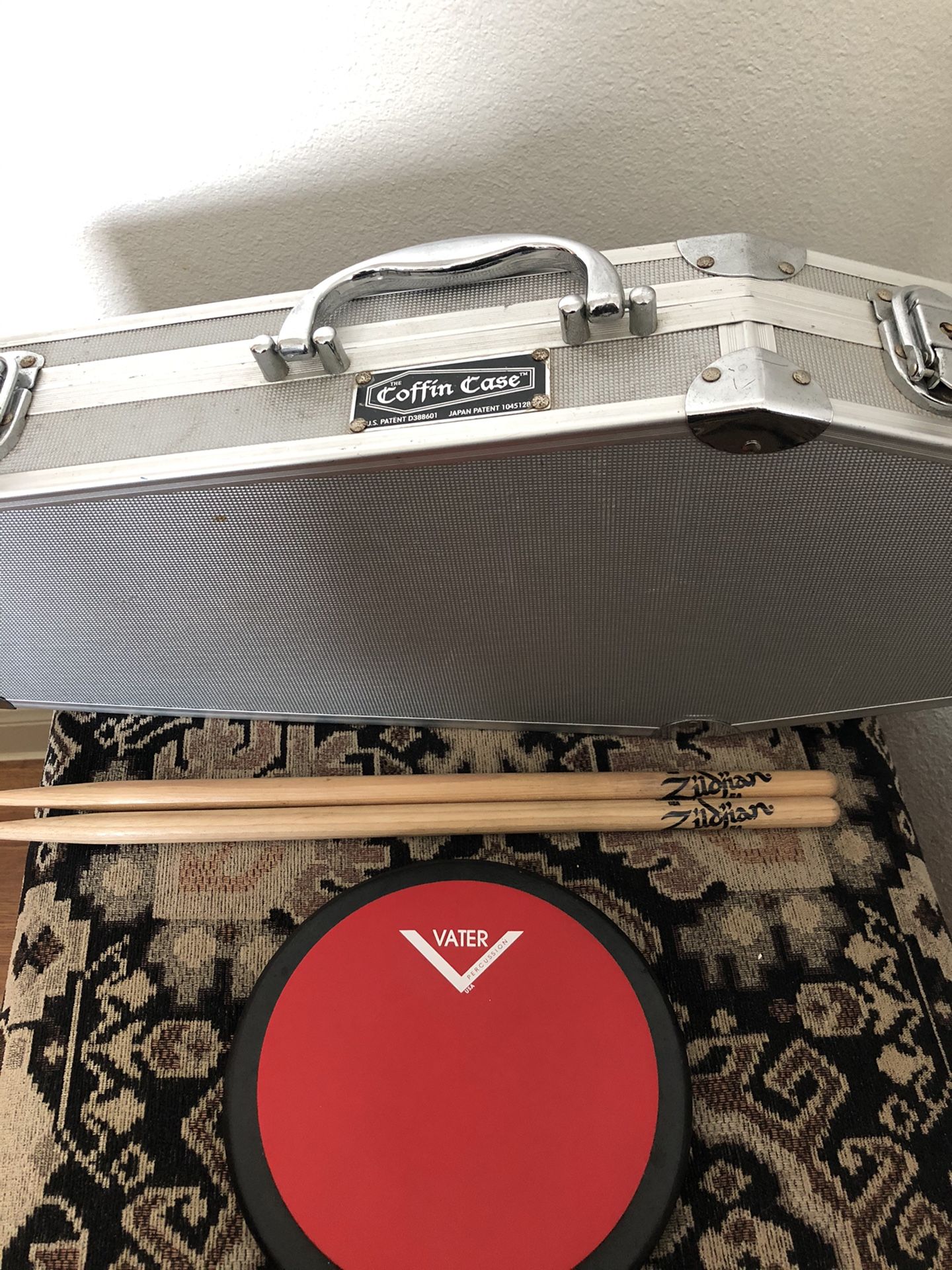 Coffin case 6in Vader drum pad and 2 zildjan sticks