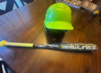 Boys helmet and bat