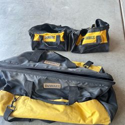 3 tools bags two bags of drill bits and one of tools.