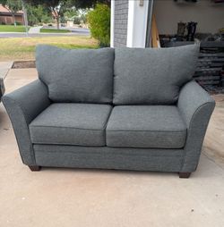 Like New Gray Pillow Back Loveseat Couch