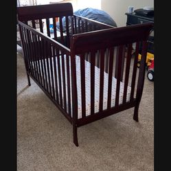 Crib & Simmons mattress. Crib has knicks & scratches, see pics for condition. Mattress in excellent condition - no stains or rips