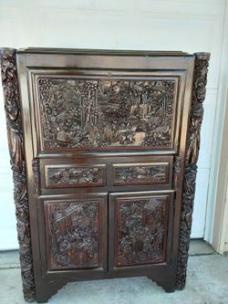 Antique Chinese Heavily Carved Wood Cabinet