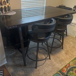 Hard Wood Dark Glass Center Dining Table With Wine Storage Below 