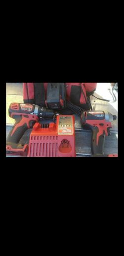 New Milwaukee M18 Drill 2606-20, Impact 2850-20, Charger, 1 (Semi-New) Battery 1.5Ah and Bag