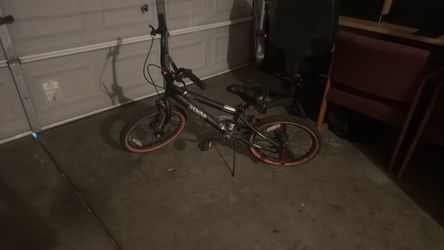 Black BMX Bike with Red Rims