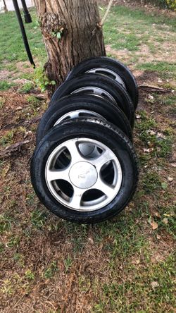 4 Aluminum Mustang Rims and Tires 
