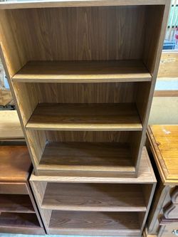Brown bookcase shelves