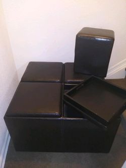 Large coffee table with nesting stools and trays