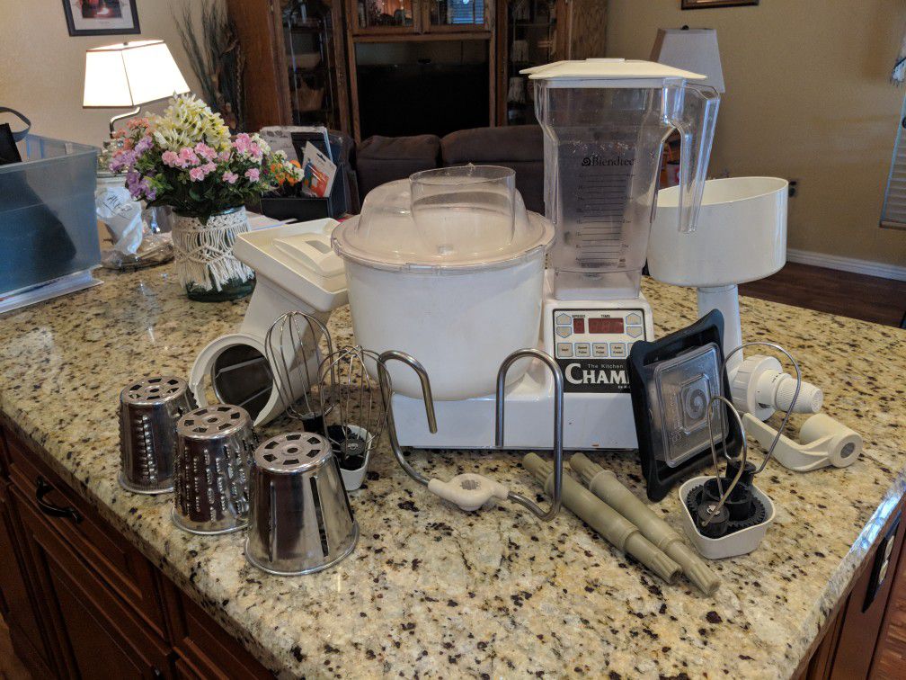 K-Tec Champ Food Processor with multiple attachments.