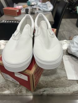 12M white slip on Vans