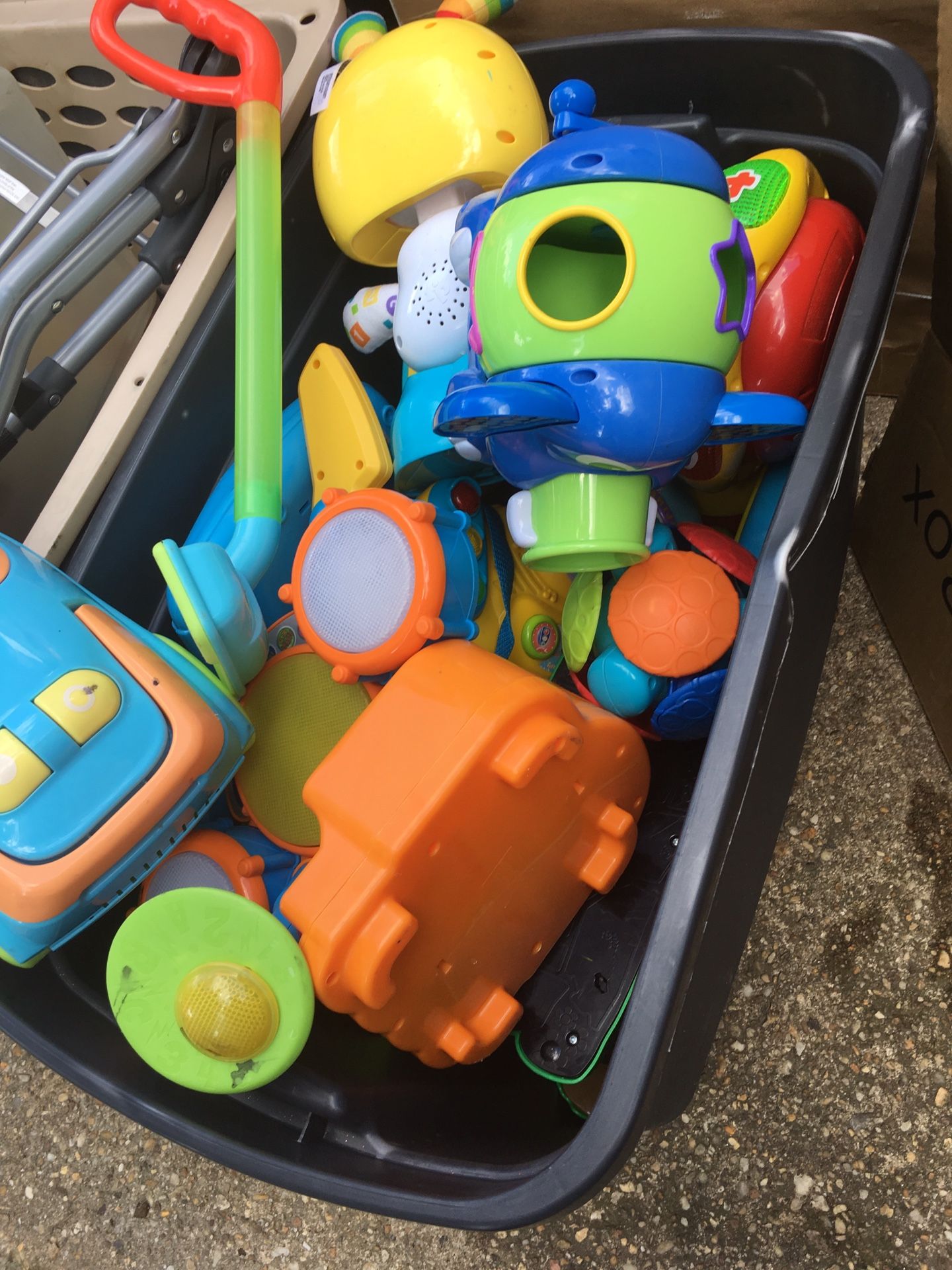 Large tote full of activity toys for 25 Firm