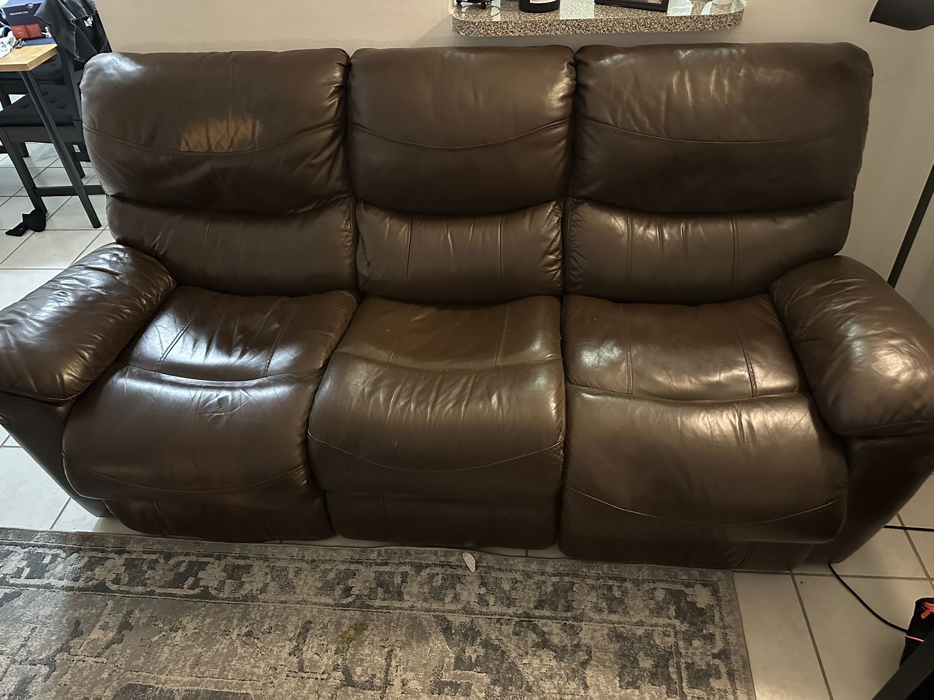 Brown Leather 3-Seater Reclining Couch - $120 (OBO)