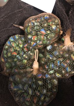 4 bags of machine made marbles