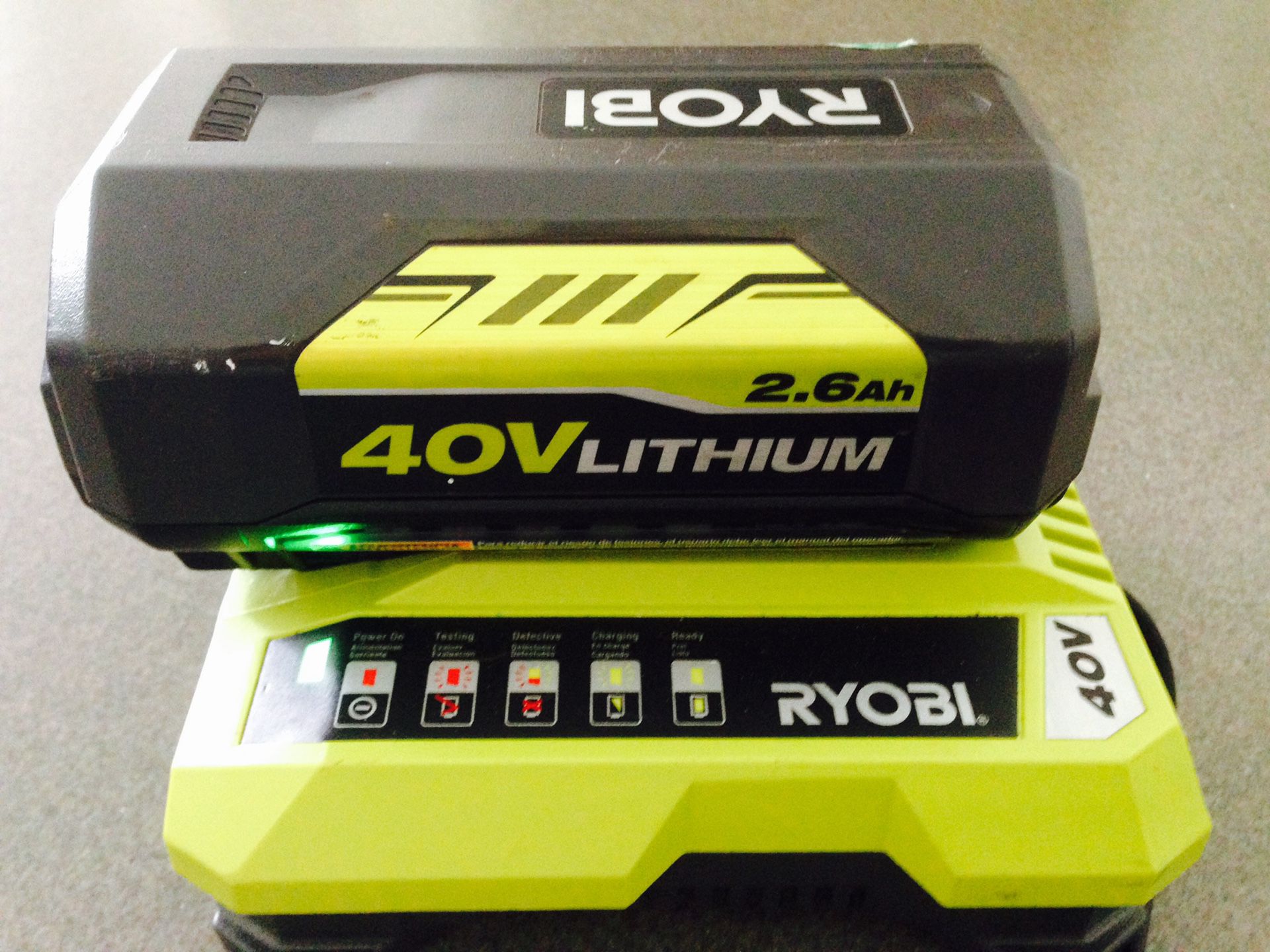 Ryobi 40 volt Battery full charge with battery charger firm on the price