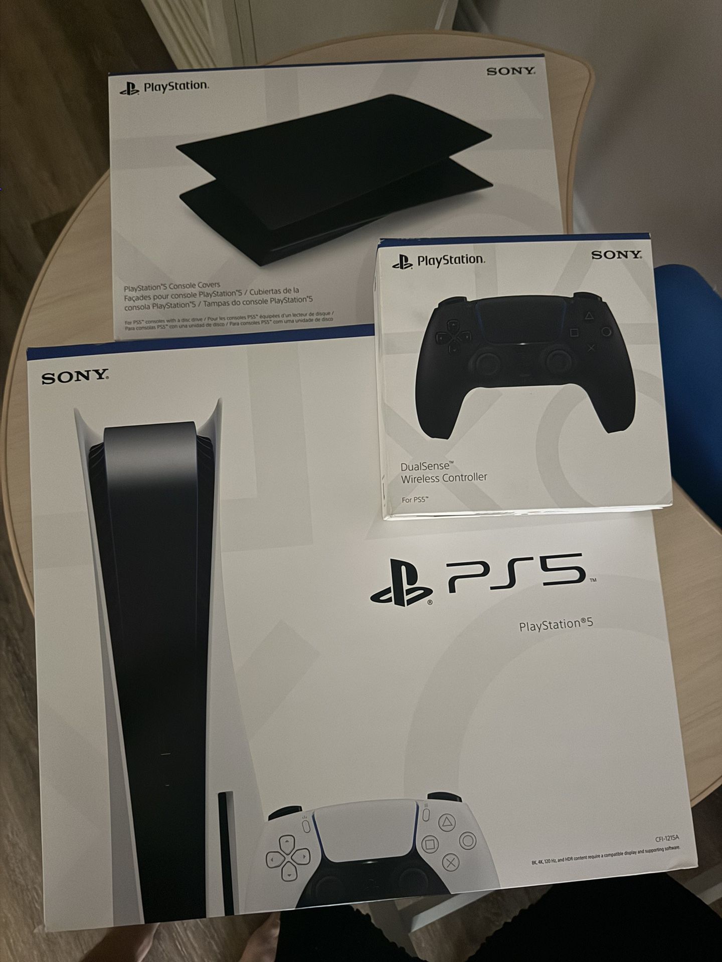 Brand new And Sealed PS5 Disc edition Console With Extra Controller And Black console Covers
