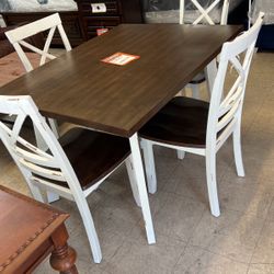 Brand new dinette with four chairs for $499