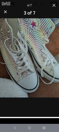 This is a Converse Chuck Taylor All Star High Metallic Exploding Star sneaker in white sz-10