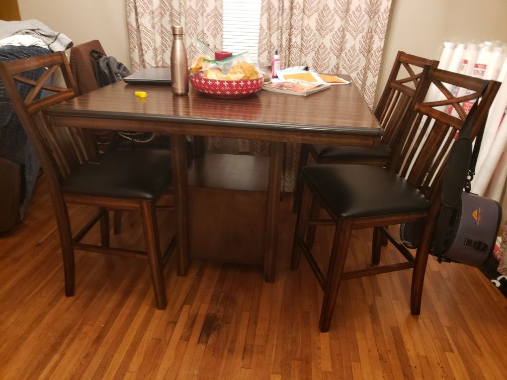 Dining table with storage and 4 chairs